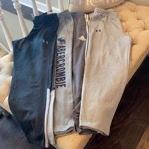 4 Pr. Like New Boys size 10-12 sweatpants. 2 pr. of Under Armour, Adidas & A & F